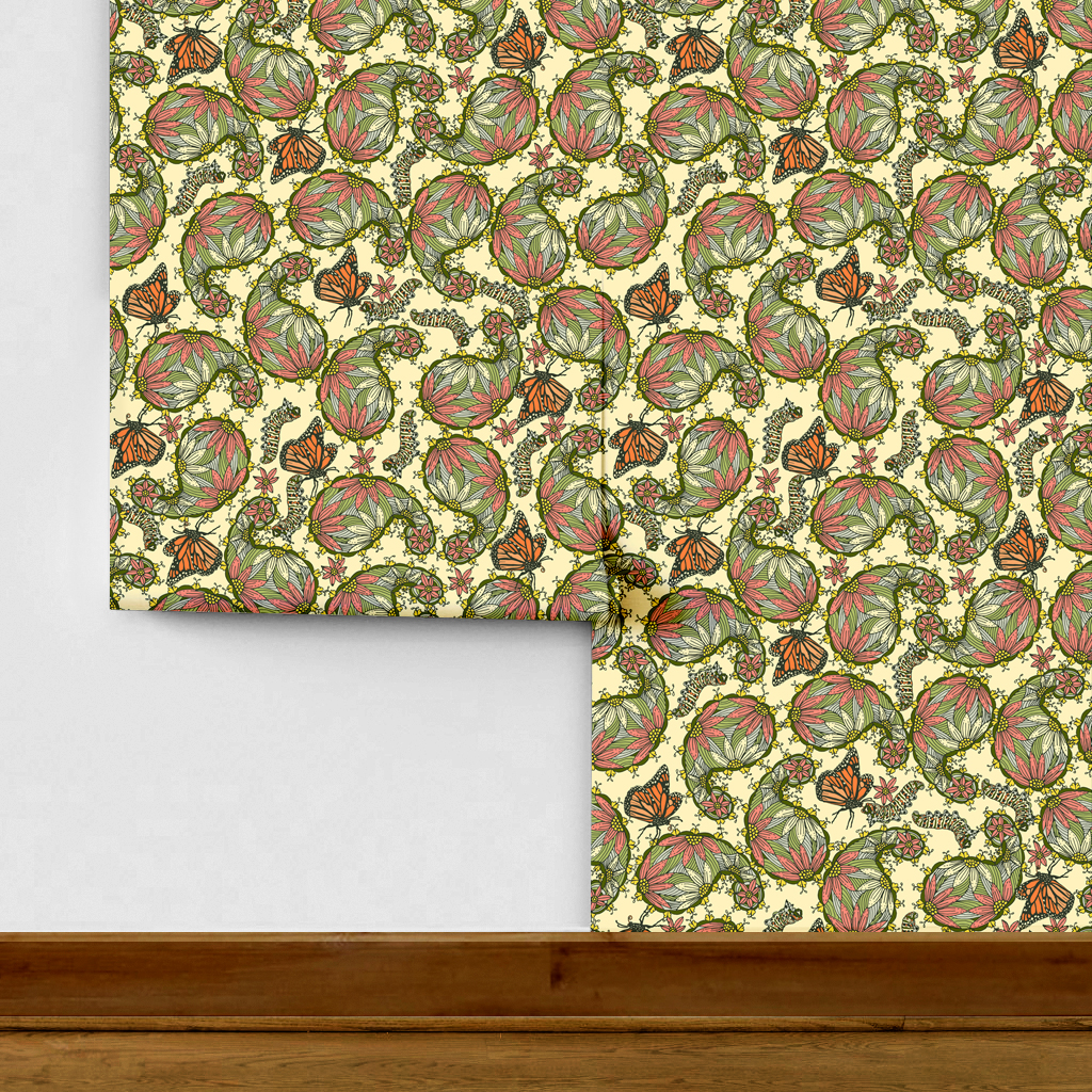 The artwork features a dense, seamless pattern composed of intricately detailed butterflies, caterpillars, and flowers. The butterflies are primarily orange with black and white accents, conveying a monarch butterfly design. The caterpillars are segmented and textured with earthy tones of green and beige, blending naturally with the floral elements. The flowers have petals colored in shades of pale pink and green, with leaves interspersed throughout the composition. The background is a light, muted yellow, which enhances the vibrant colors of the butterflies and floral motifs. The overall design is highly decorative and organic, showcasing a lyrical interplay between the stages of a butterfly's life cycle and plant life.